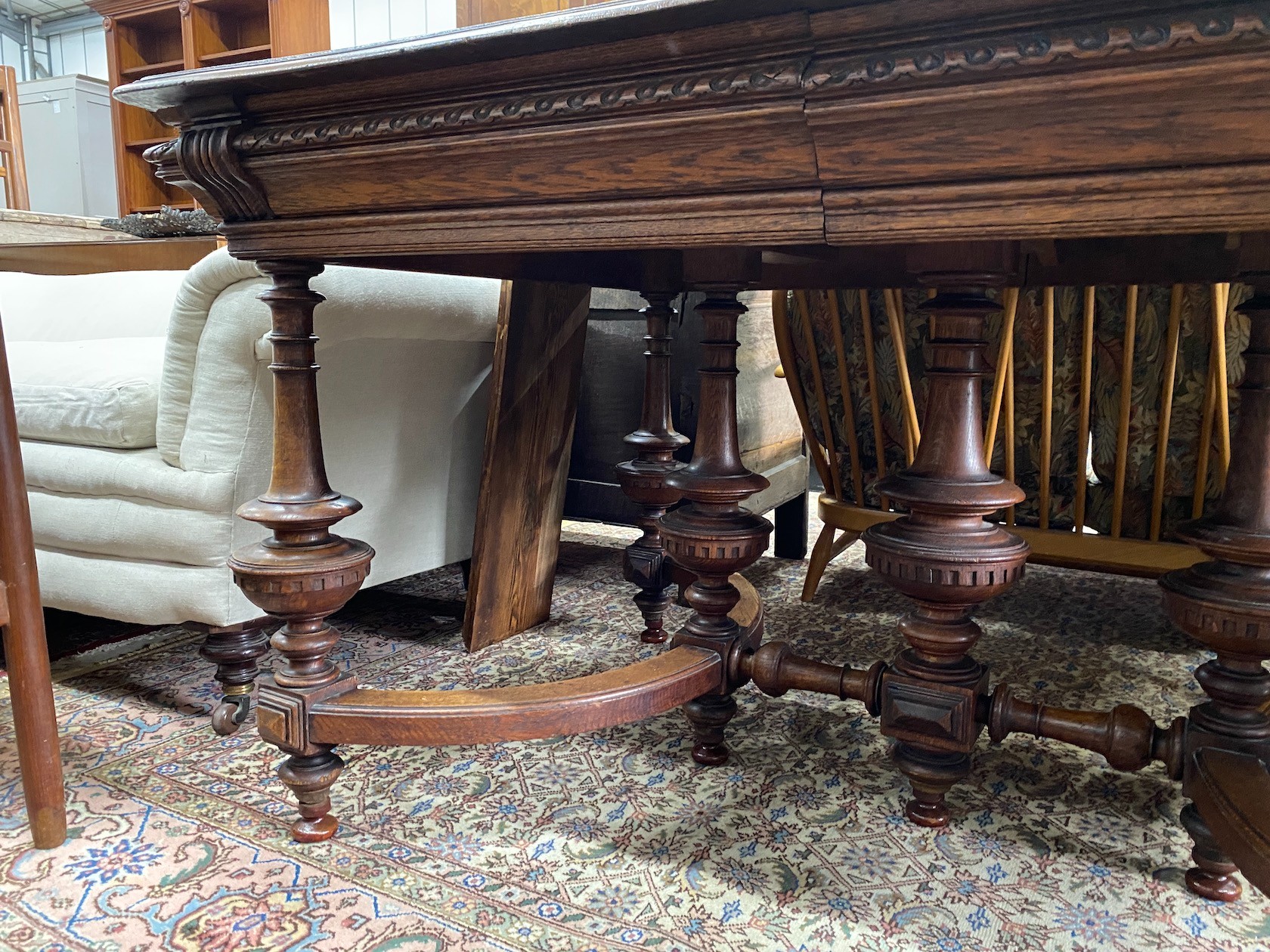 A late 19th / early 20th century French oak extending dining table, (one spare leaf) length 125cm, depth 99cm, height 77cm